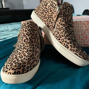 Cutest, little zip up bootie sneakers. I have worn them once.